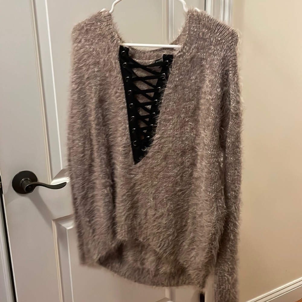Long sleeve lace up fuzzy sweater